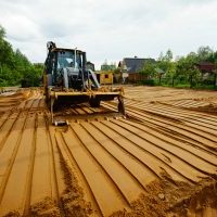 Отсыпка и выравнивание земельного участка по цене от 255 руб./м³